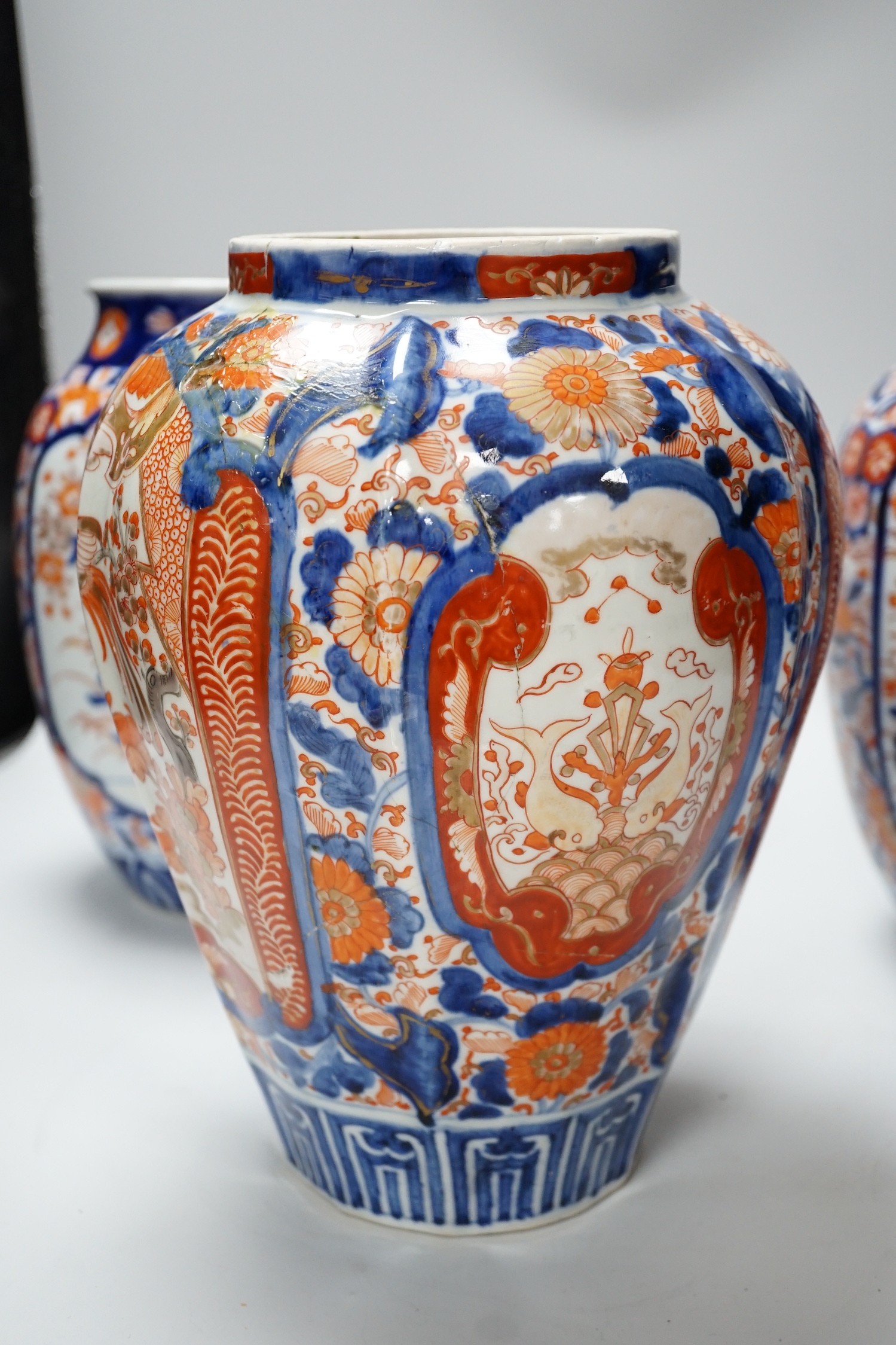Three large Imari vases, tallest 28.5cm
